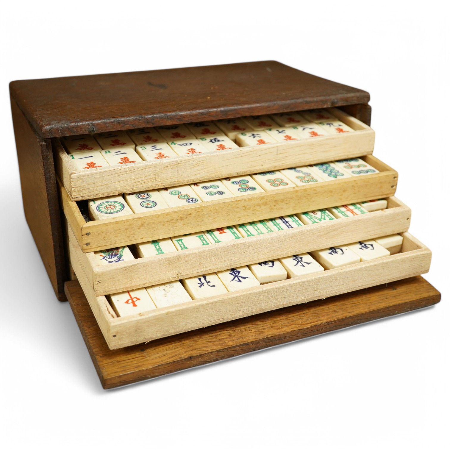 A Chinese bone mahjong set, cased, 23cm wide. Condition - fair